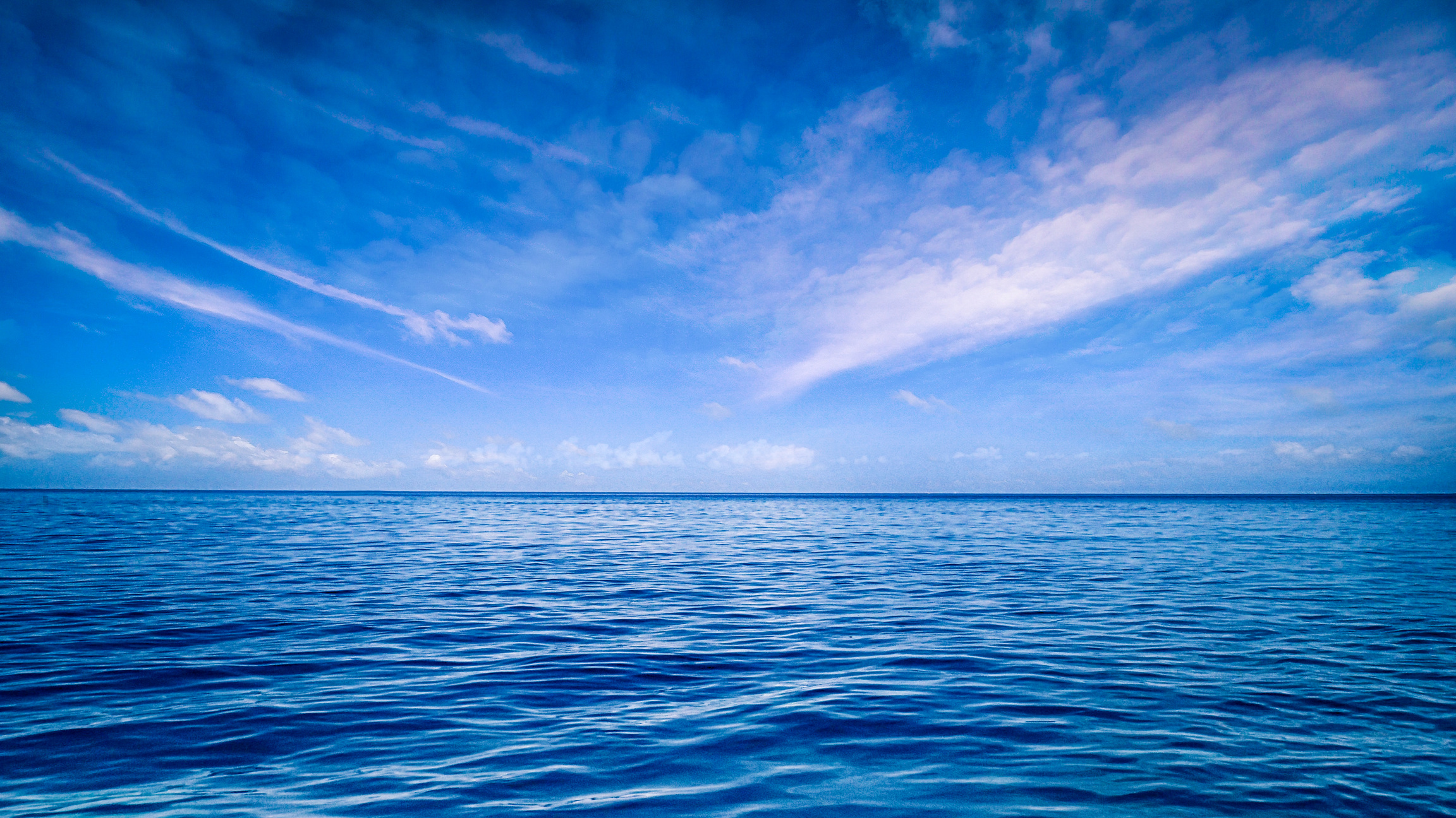 Blue Sea Under Blue Sky